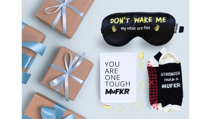 hospital care package with grip socks eye mask ear plugs and motivational card