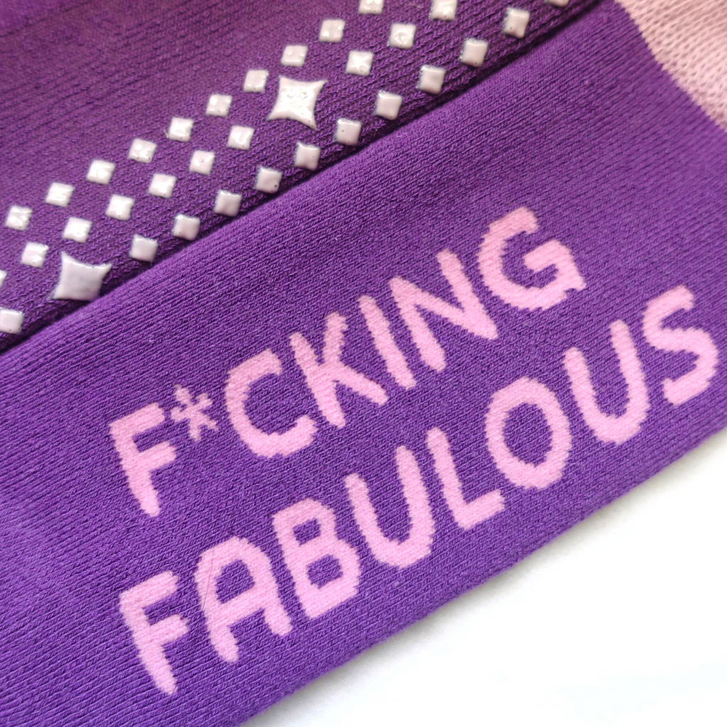 Zoomed-in view of 'F*cking fabulous' text on funny grippy sock