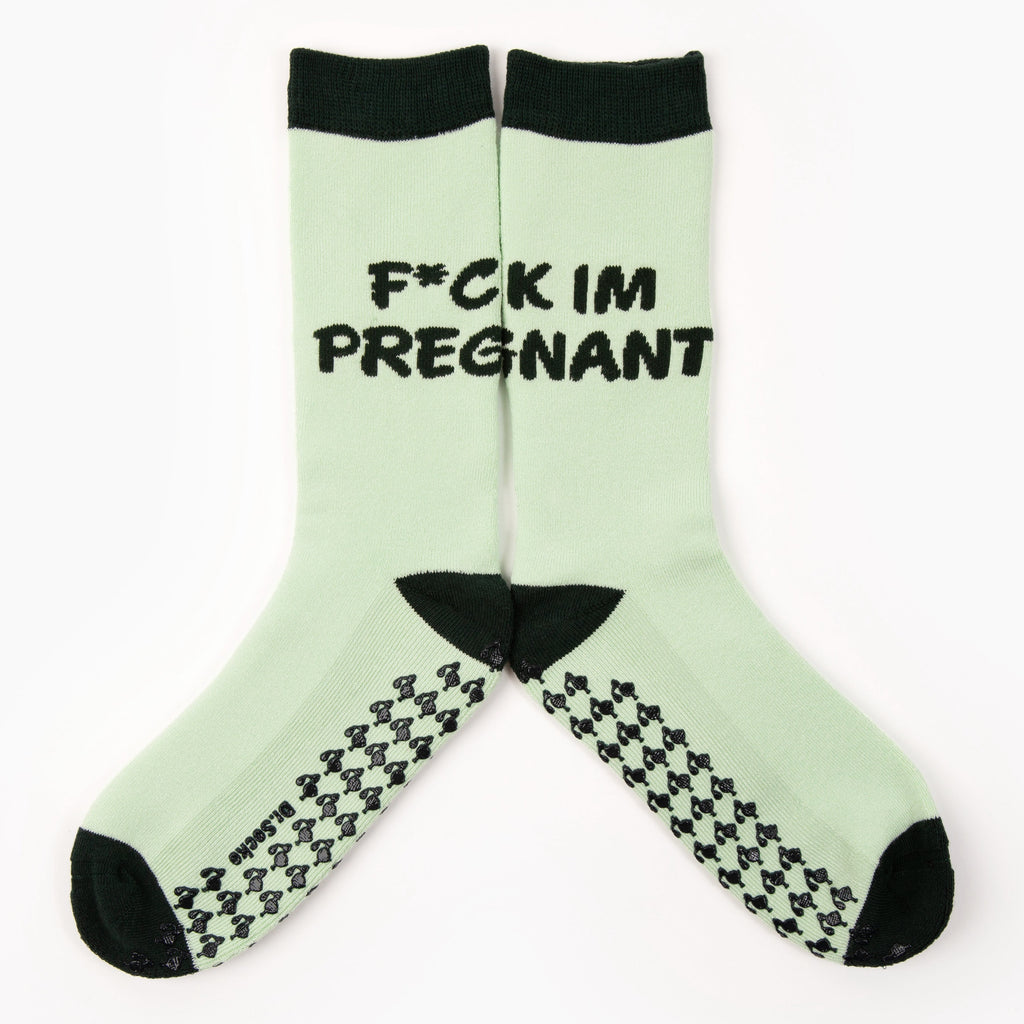 Funny 'f*ck I'm pregnant' grippy sock, a hilarious gift for new mom. Perfect addition to a hospital bag, mommy bag for hospital, or as a best baby shower gag gift.