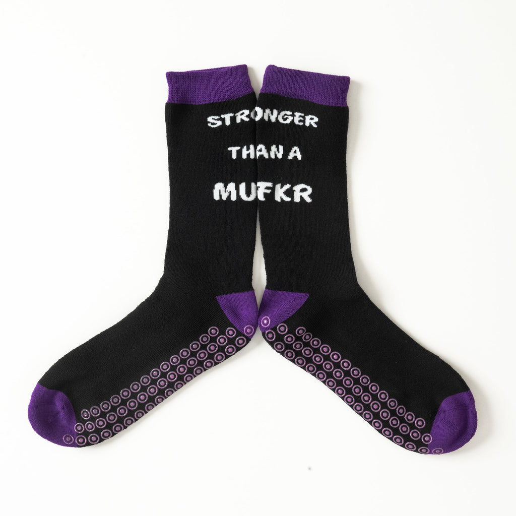 Purple hospital grip socks with funny 'stronger than a mufkr' message, motivating gift for cancer patient